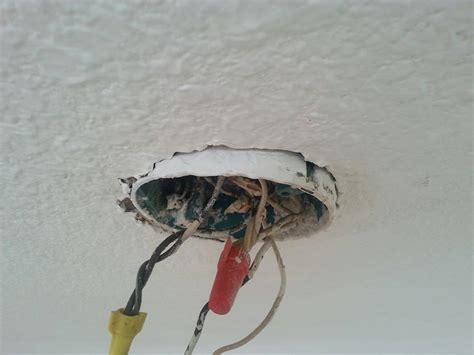 ceiling fan junction box in dropping out of ceiling|how to replace ceiling fan.